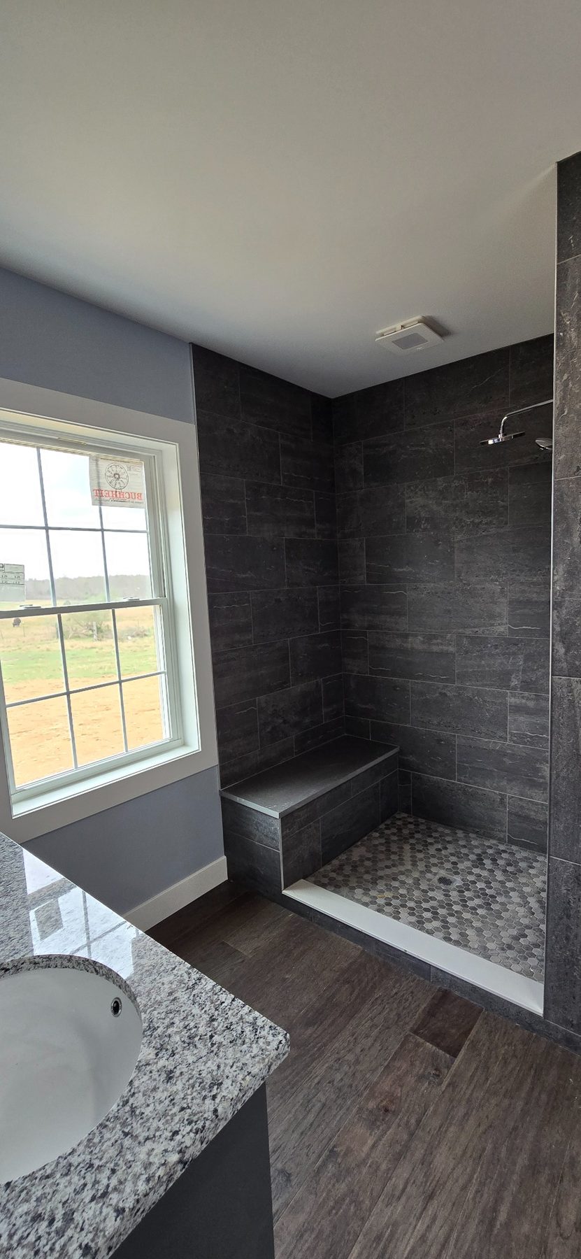 Bathroom with tiled shower