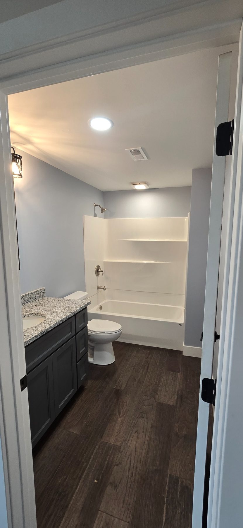 Bathroom with built-in shelves