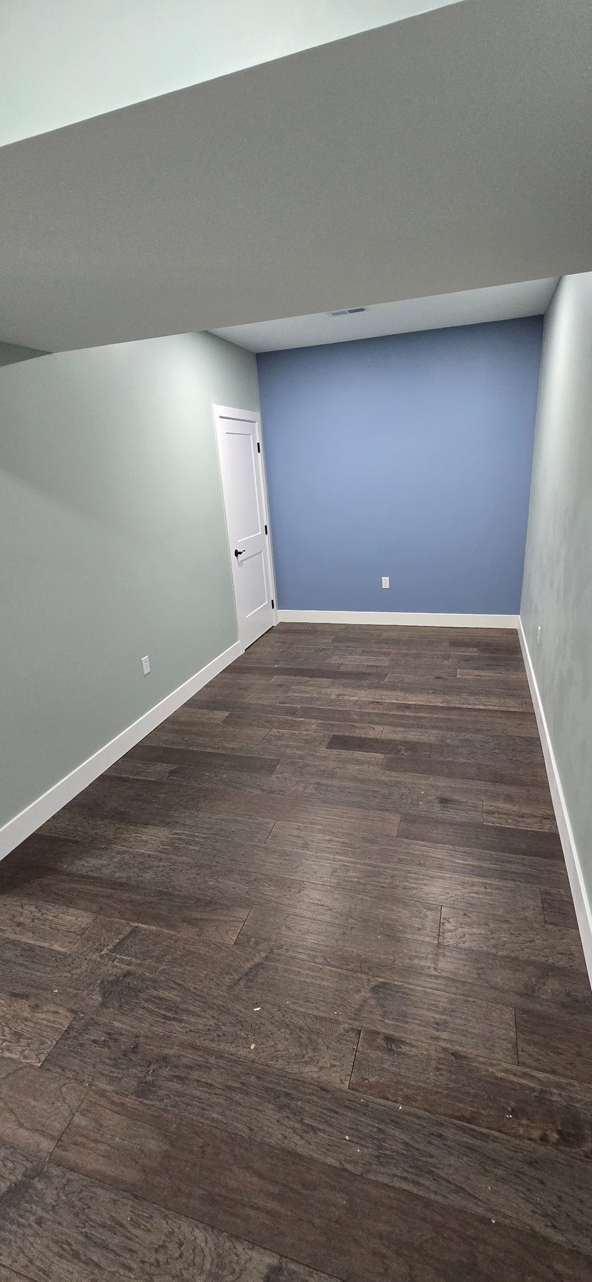 Room with blue accent wall