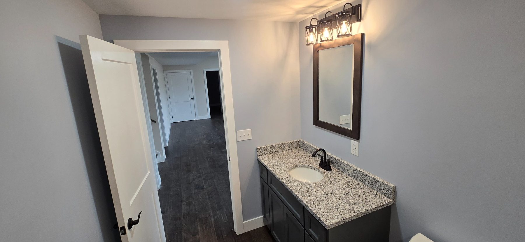 Bathroom vanity and hallway