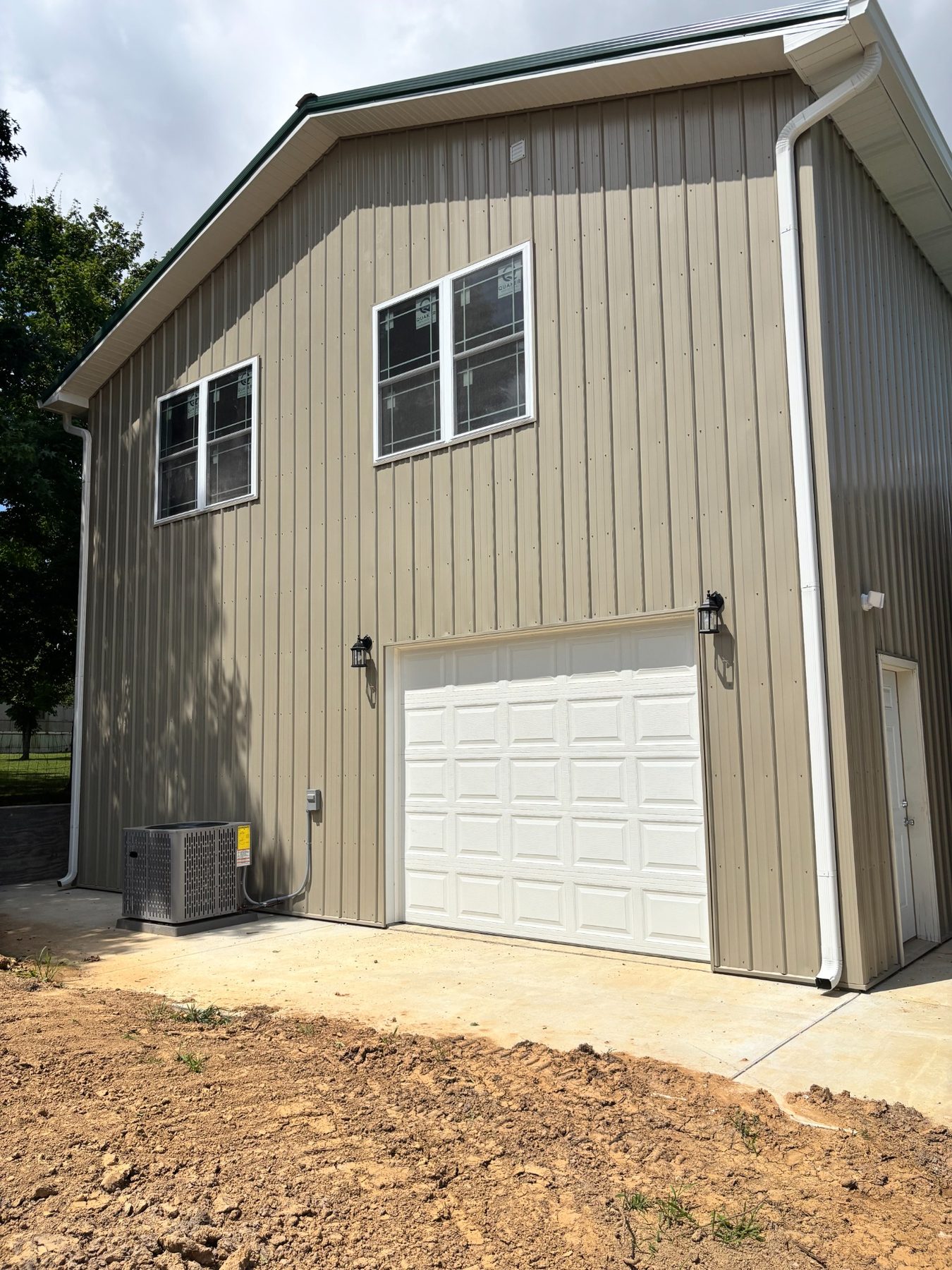 Side of the garage with living quarters above