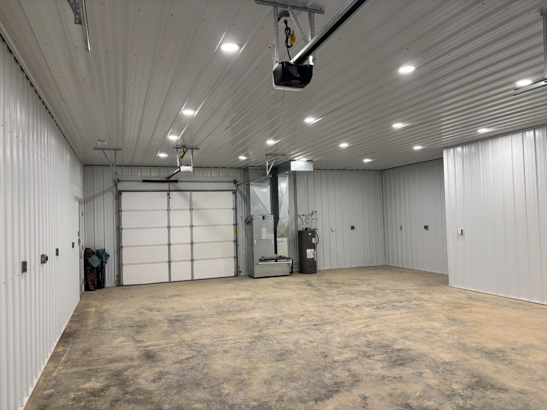 Finished garage interior with overhead doors