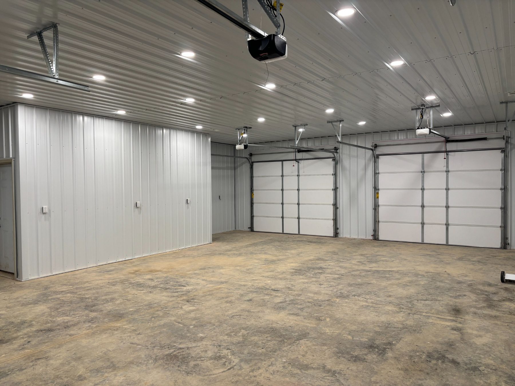Garage interior with two overhead doors
